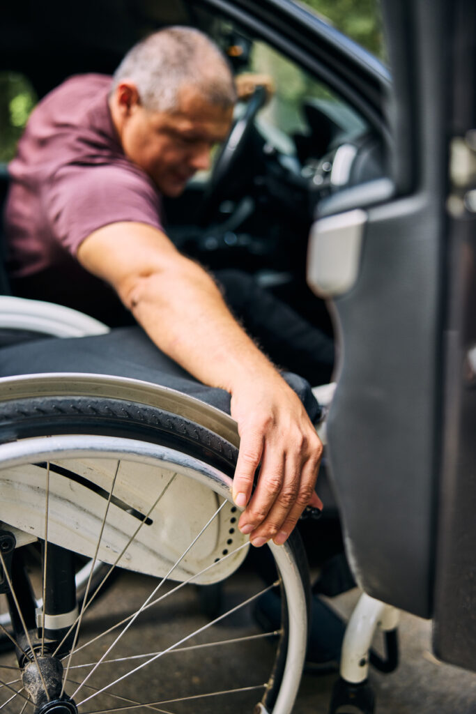 Male driver using a disability van and wheelchair accessible vehicle